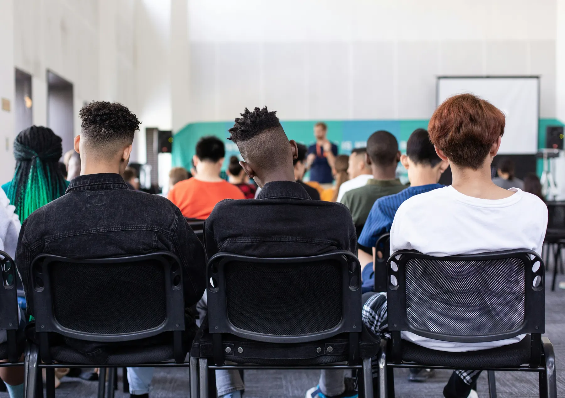 Students listening in a classroom