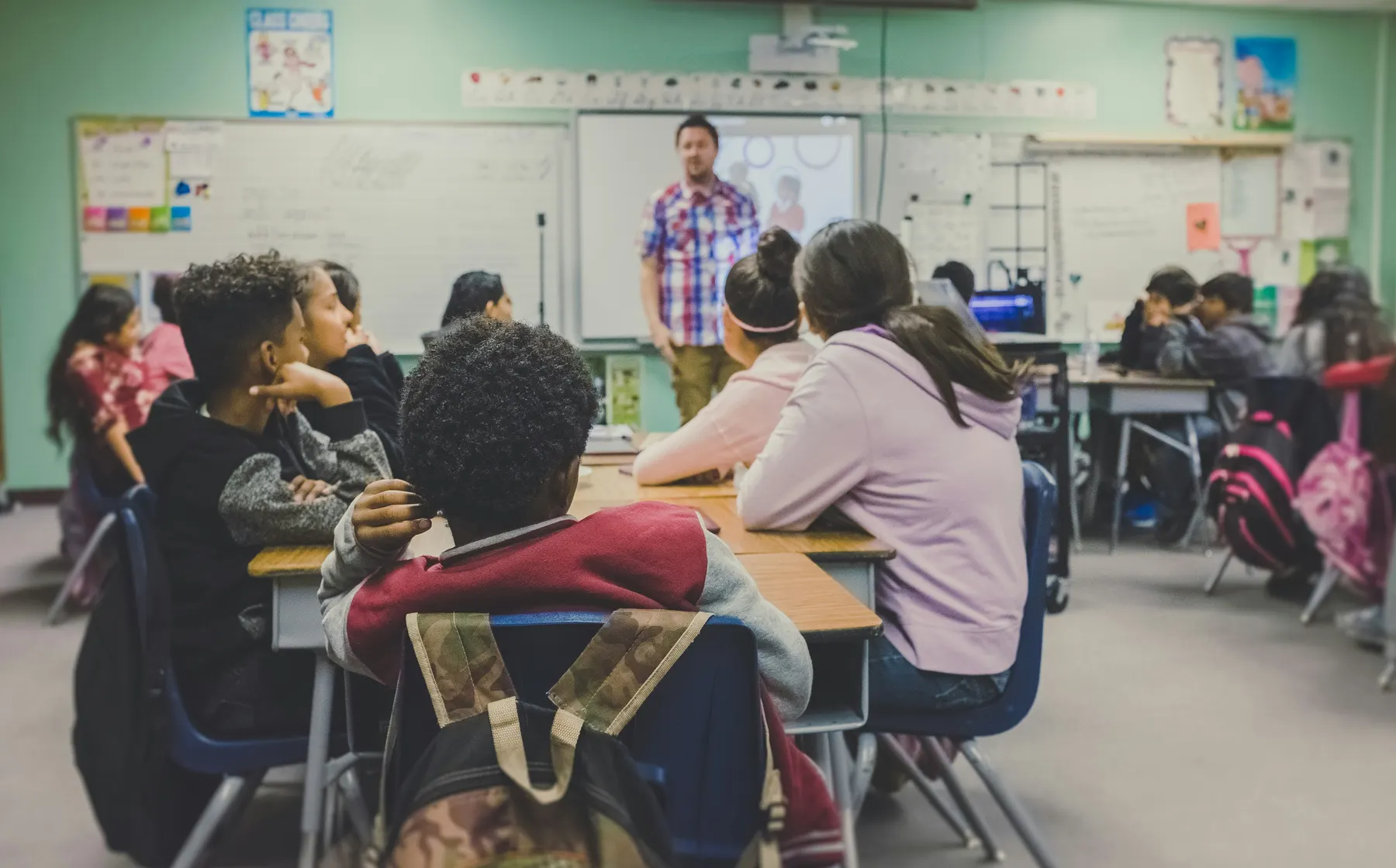 Students working at their desks in class